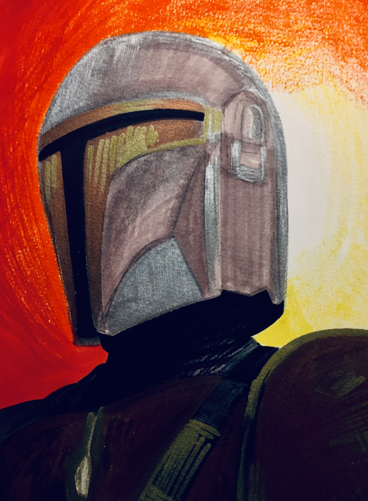 An image of the Mandalorian's helmet with an orange and yellow sunset in the background.