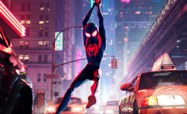 Image shows Miles Morales swinging past a cab in New York City.