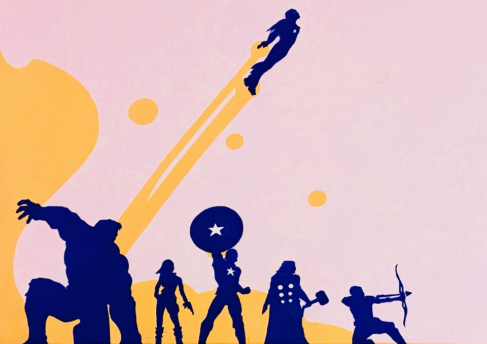 The original six Avengers appear in purple against a pink and yellow background.