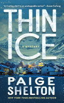 Book cover reading "Thin Ice" by Paige Shelton, featuring a small town against a snowy, mountainous landscape