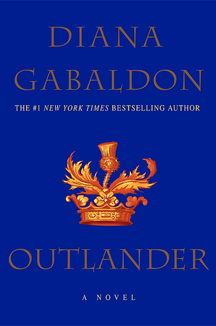 Book cover with brown text reading "Outlander" by Diana Gabaldon, featuring an elaborate, gold crown against a deep blue background