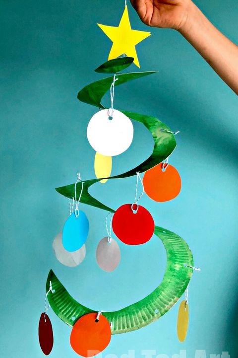 Using a paper plate and papers, create a fun Christmas Tree mobile art project.
