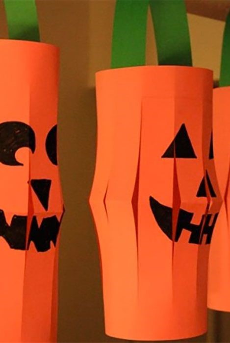 Using bright orange and green paper and string - create a fun Jack-o-Lantern Halloween garland.