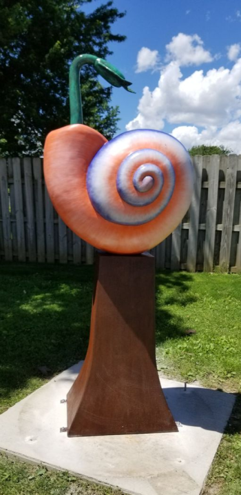 Snail shell on pedestal "Awake" sculpture