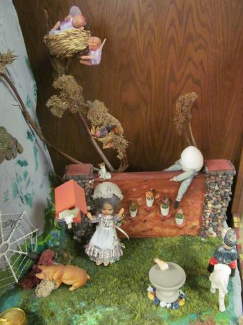 Closeup of dolls in Story Mountain exhibit