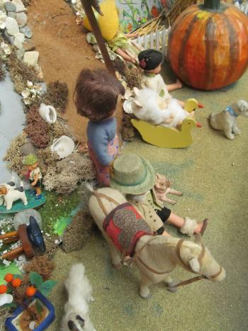 Closeup of dolls in the Story Mountain exhibit