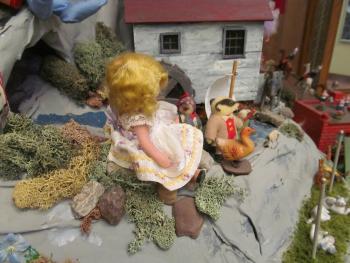 Closeup of dolls in the Story Mountain exhibit