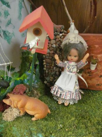 Closeup of dolls in the Story Mountain exhibit