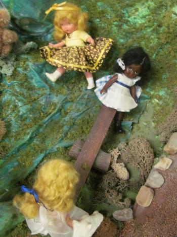 Closeup of dolls in the Story Mountain exhibit