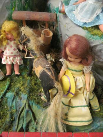 Closeup of dolls in the Story Mountain exhibit