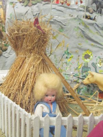 Closeup of dolls in the Story Mountain exhibit