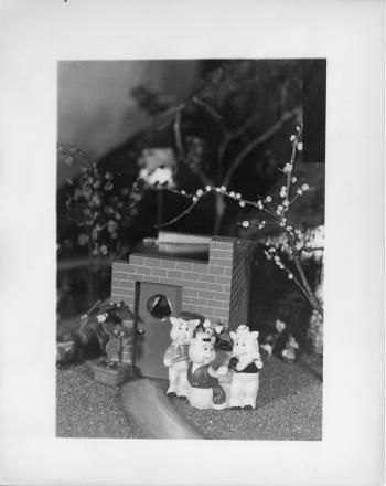 Wolf and three pigs figurines in brick house scene as part of historic RIPL children's library Fairyland display