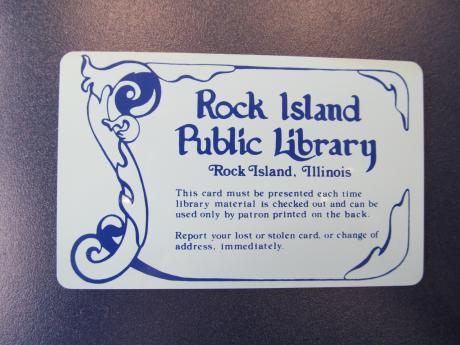 Historic RIPL library card with script and scroll detail