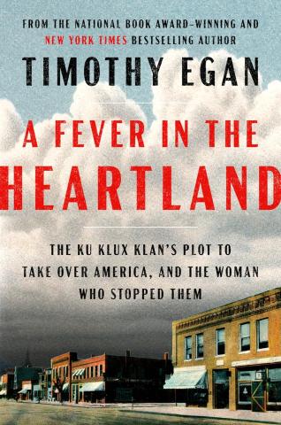 The book cover shows store fronts in a small town with dark storm clouds overhead.