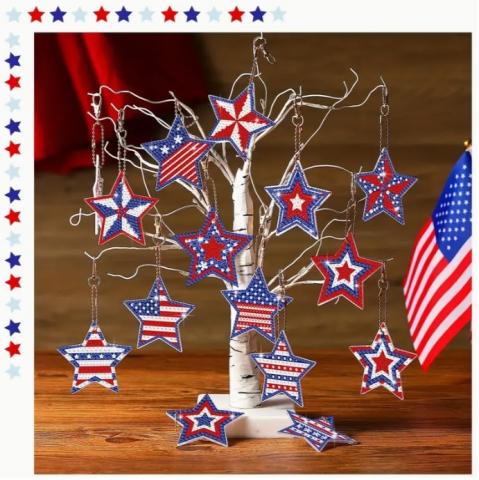 Image of patriotic-themed ornaments hanging from a small, artificial tree