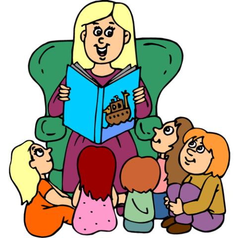 blonde haired woman sitting in a green chair reading a blue book to five children at her feet