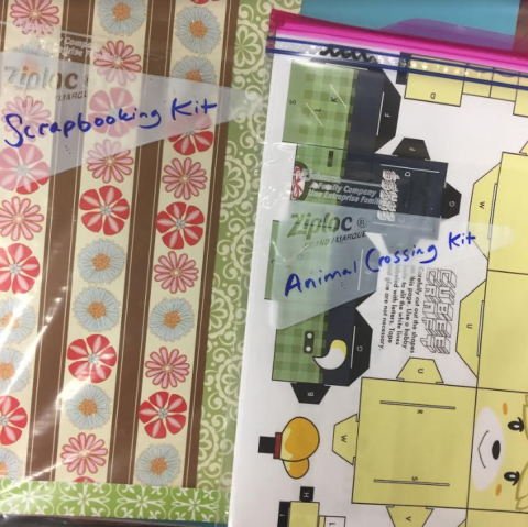 Picture of kits in plastic bags with paper materials for scrapbooking and creating an Animal Crossing craft. 