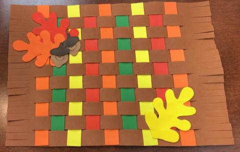 Weave a placemat using foam cut-outs from a kit.