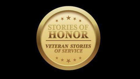 Gold Seal on Black Background with event title 