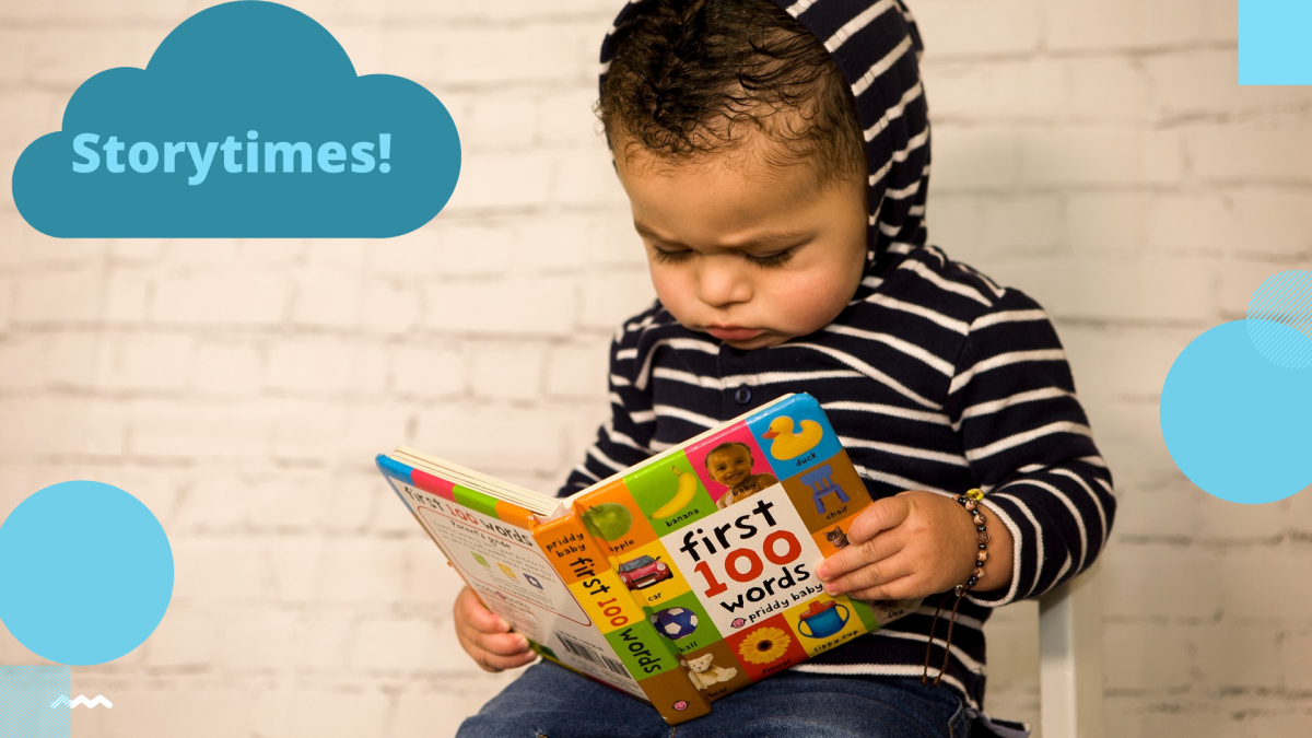 toddler in small chair reading book that says First 100 Words 