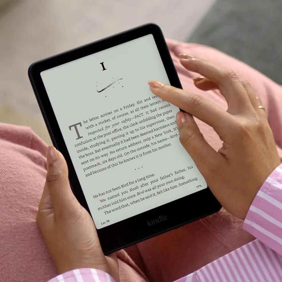 Person touching screen of an ebook reader