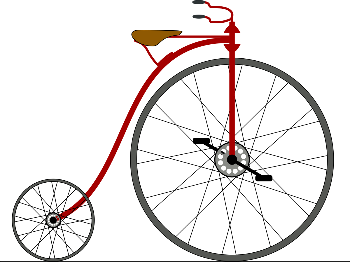 Image of early bicycle with huge front wheel and small back wheel