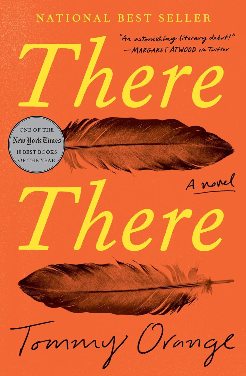 The orange book cover depicts two feathers juxtaposed to the two words of the title