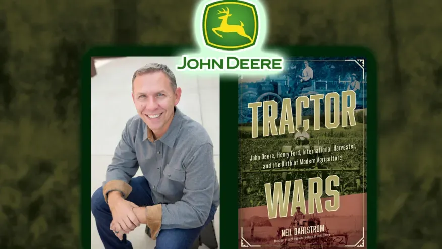 Author Neil Dahlstrom appears to the left of his book