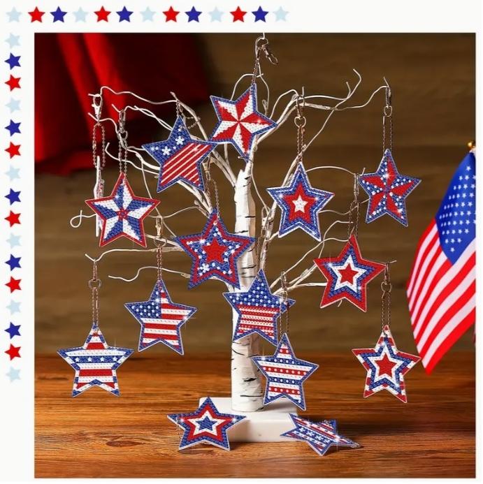 Image of patriotic-themed ornaments hanging from a small, artificial tree