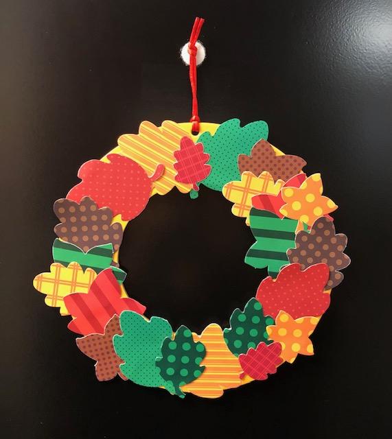 Create a pretty Fall Leaf Wreath with paper.