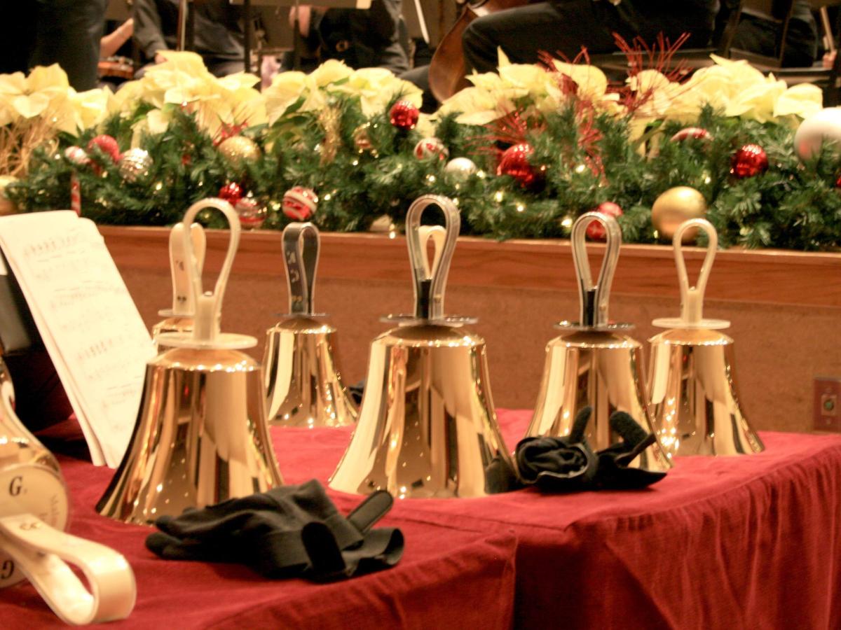 River Bend Bronze bells sitting on table